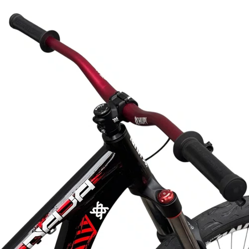BICICLETA HUPI NAJA 2026 PRETA/VERMELHA ARO 26 WHEELING/GRAU