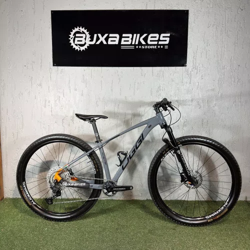 BICICLETA OGGI BIG WHEEL 7.3 DEORE 12V GRAF/LARANJA TAM P